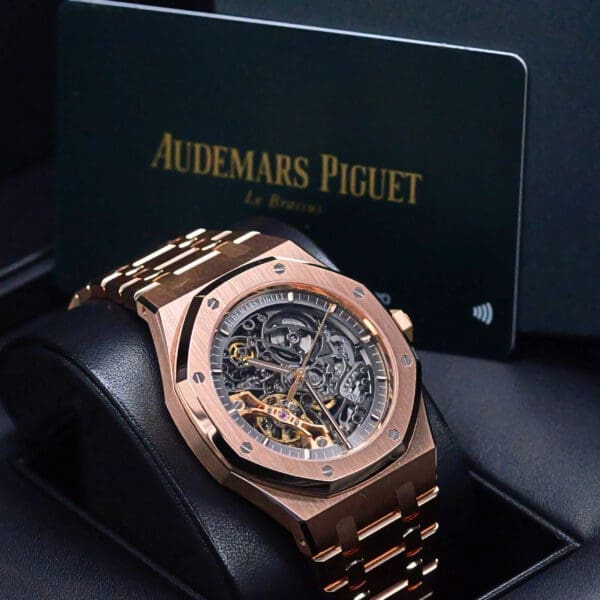 Audemars Piguet أوديمار بيغيه رويال أوك — سكيليتون روز غولد — حركة ظاهرة، إطار مثمن، بطاقة الدار الرسمية
