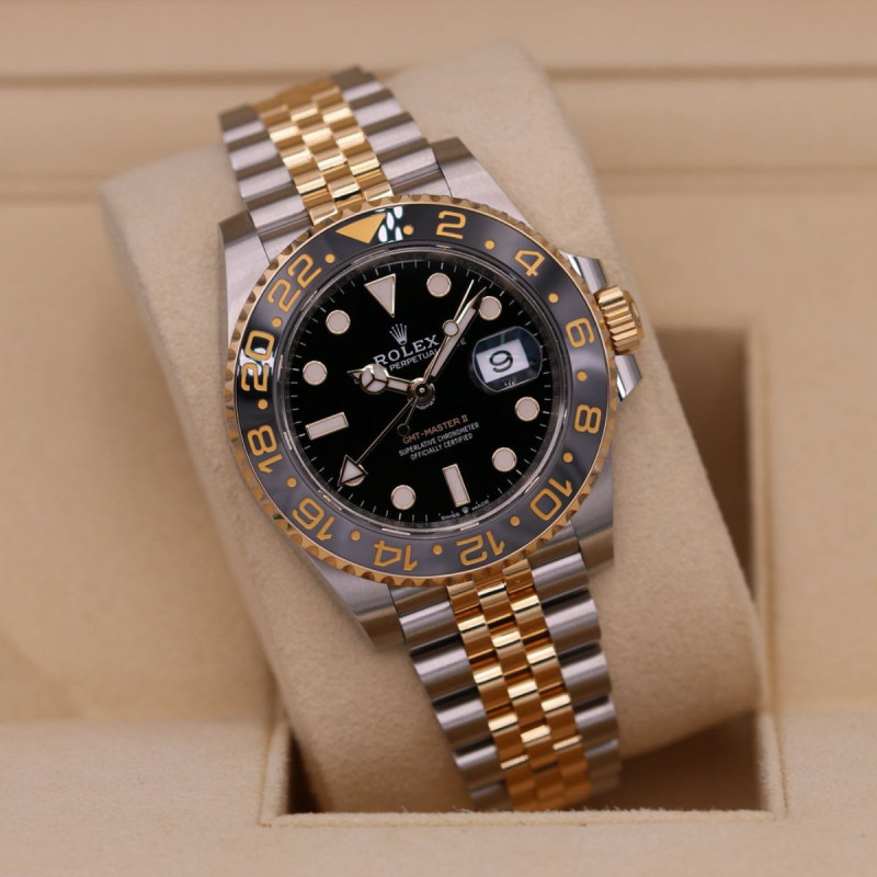 Rolex رولكس GMT-Master II — Root Beer — ثنائي اللون روز غولد وفولاذ، إطار بني وأسود